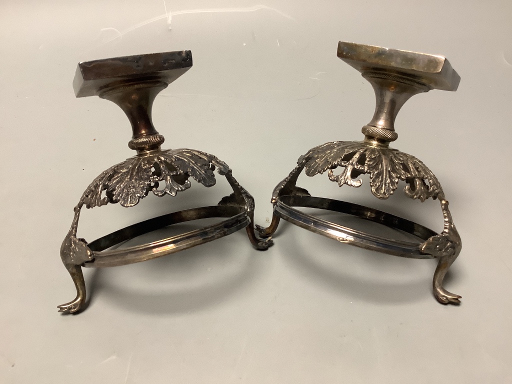 A set of four 19th century French pierced white metal circular pedestal salts with swan neck handles and later? blue glass liners